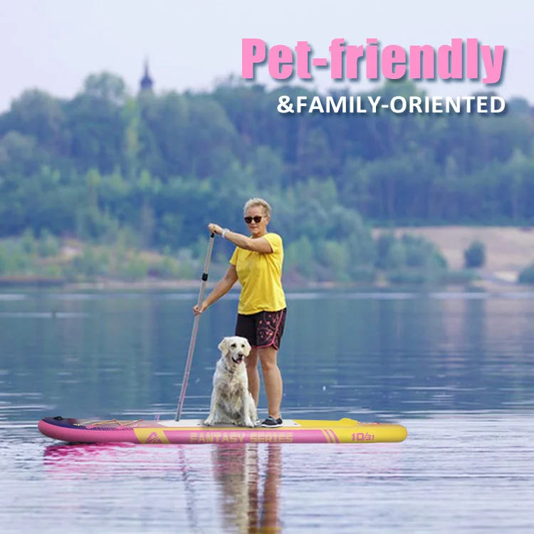 A person standing on a paddleboard with a dog on a calm lake. The board is pink and yellow, and the background shows a forested shoreline.