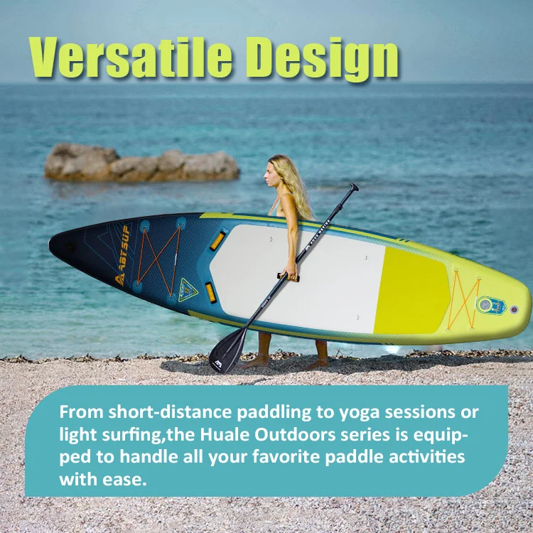 Stand-up paddleboard with a paddle on a pebbled beach, promoting versatile design. Ocean and rocky outcrop in the background.