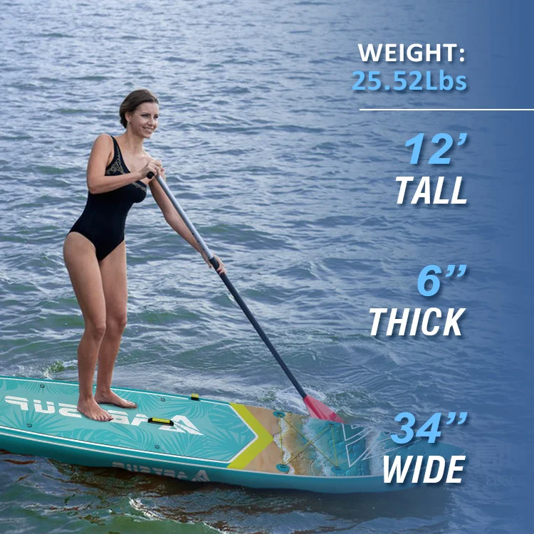 Woman in a black swimsuit paddleboarding on a vibrant, multicolored board in calm water, displaying board dimensions and weight.